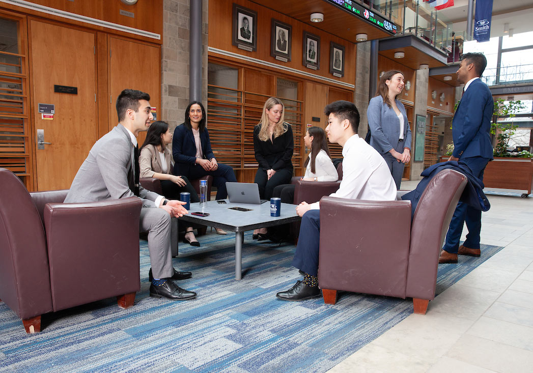 students talking in Goodes Hall