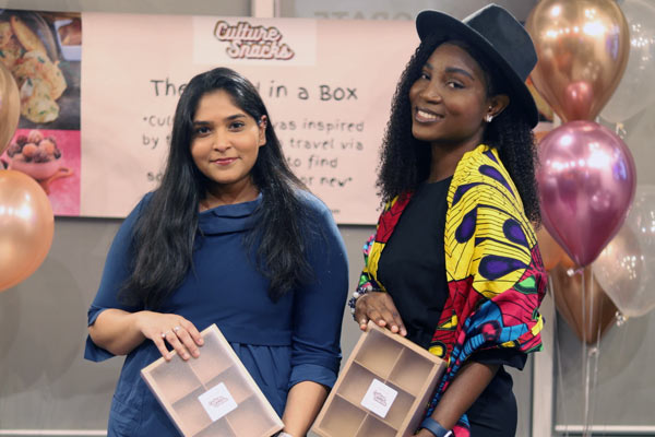 Esther and Aditi at the Culture Snacks booth