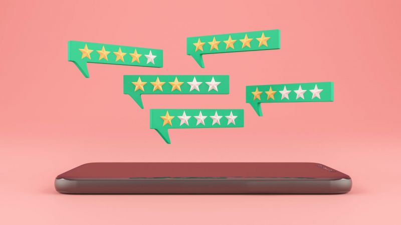 Mobile phone and comment bubbles with different star-rating reviews