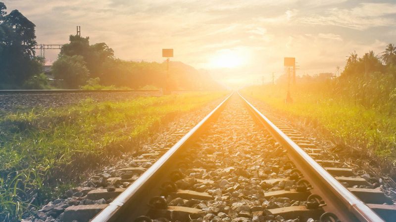 Railroad tracks at sunrise.