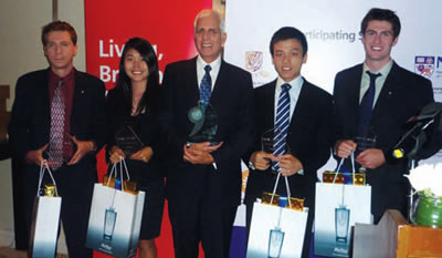 The winning team, from left: Michael Portner-Gartke, Jenny Wang, faculty advisor George Boland, Will Fang and Sheldon McCormick