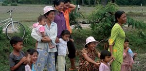 Commerce volunteers’ housebuilding efforts (left) entertain the locals (above)