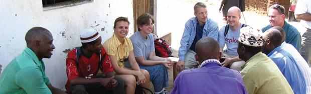 Team Canzania at a village council meeting.