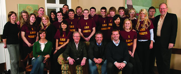 Donald (above, seated at left) and son Rob (seated beside Donald) at the Sobey Scholarship dinner