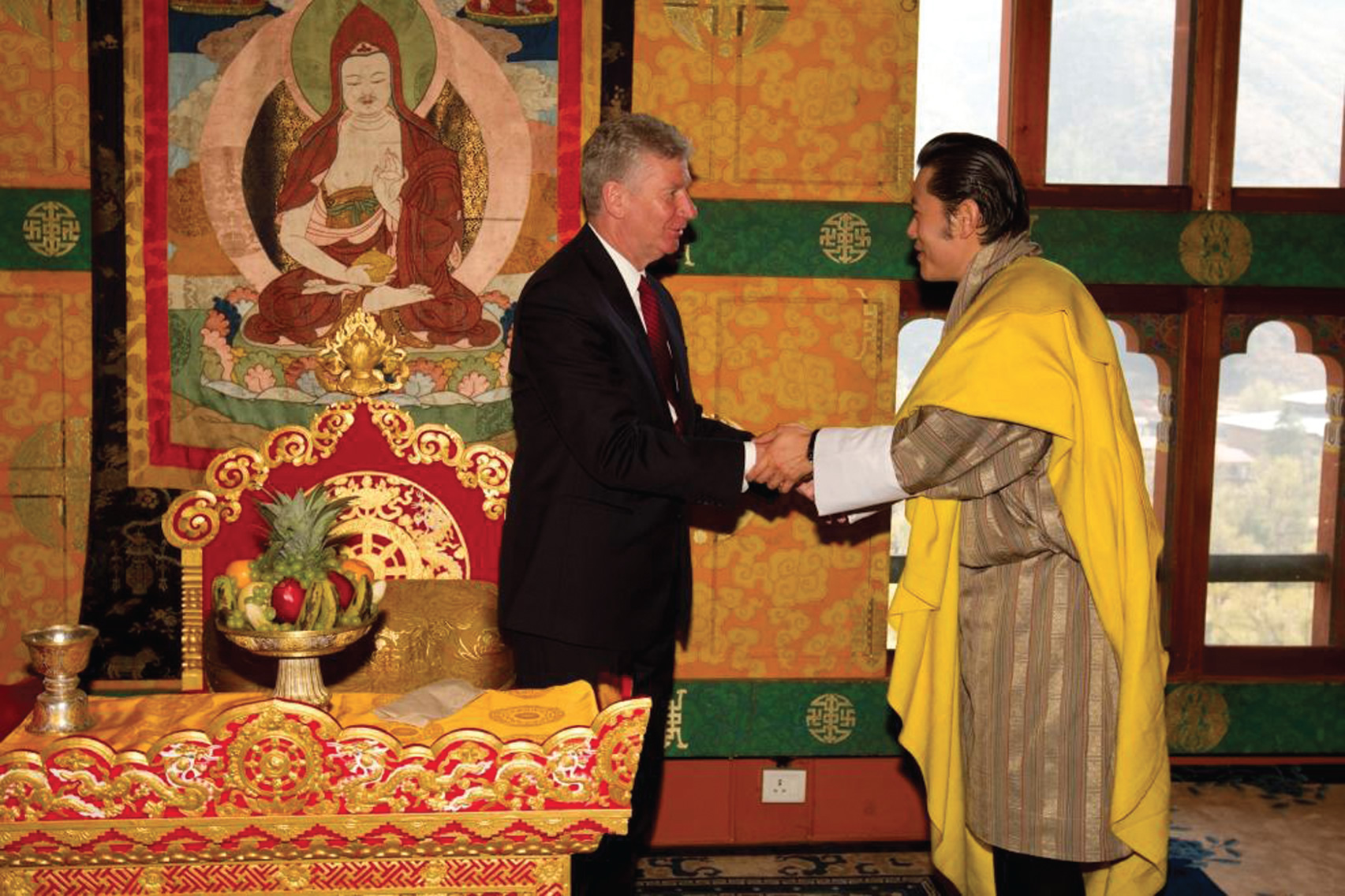 His Majesty Druk Gyalpo Jigme Khesar Namgyal Wangchuck, Mang-pos Bhur-ba’i rgyalpo, King of Bhutan (right) greets Stewart Beck after accepting his diplomatic credentials