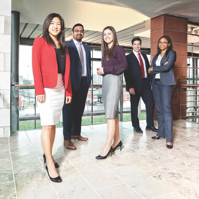 Students posing formally in Goodes Hall